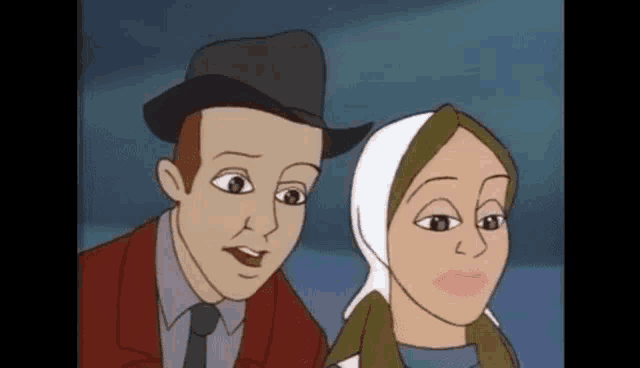 a man and a woman are standing next to each other looking at something .