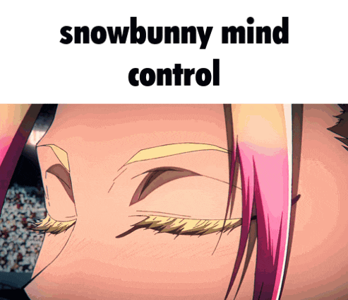 a close up of a woman 's face with the words snowbunny mind control above her