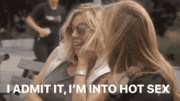 two women are sitting on a bench and one of them says " i admit it i 'm into hot sex "