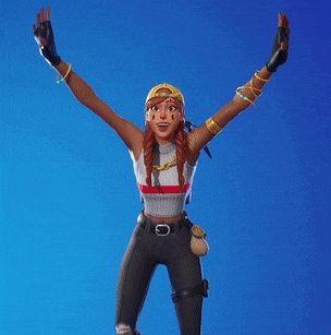 a woman with her arms outstretched wearing a hat