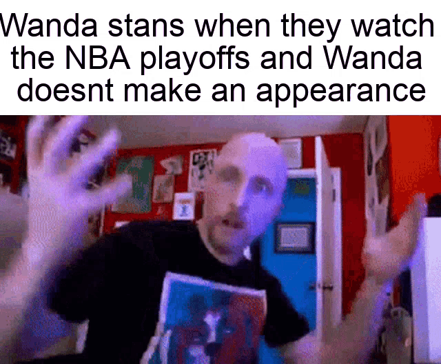a man is making a funny face while watching the nba playoffs and wanda does n't make an appearance