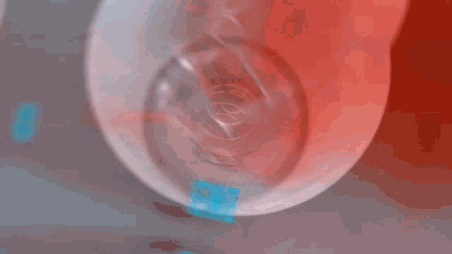a red object with the words " greases energy " on it