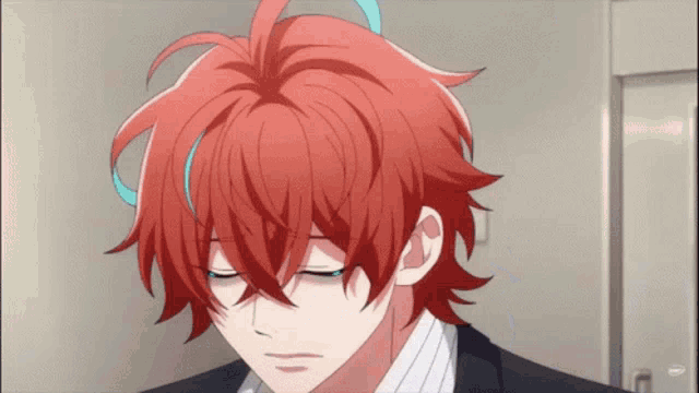 a close up of a person with red hair and their eyes closed