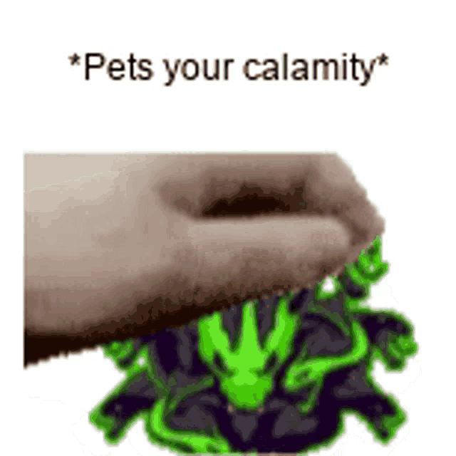 a hand is reaching out towards a pile of green and black objects .