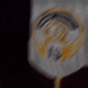 a lightning bolt strikes a silver and gold emblem that says uk