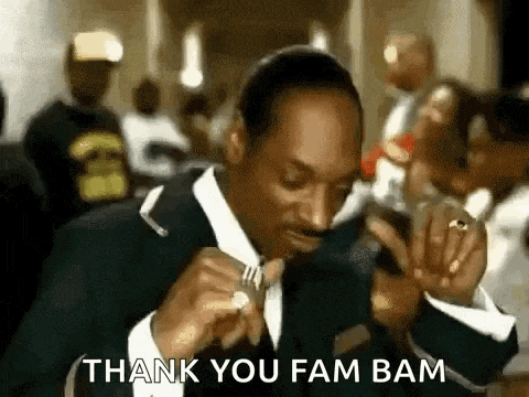 snoop dogg is eating a piece of food with a fork in a video .