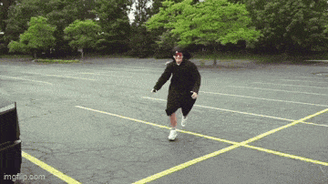 a man is running in a parking lot with imgflip.com at the bottom of the screen