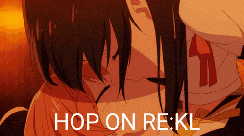 a couple kissing with the words hop on re:kl behind them