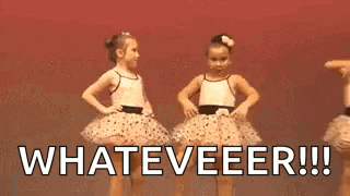 two little girls are standing next to each other on a stage with their hands on their hips and the words `` whatever ! ''