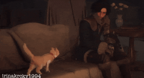a picture of a woman sitting on a couch with a cat and the year 1994 on the bottom