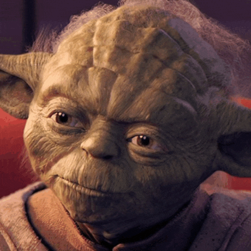 a close up of yoda 's face in a star wars movie