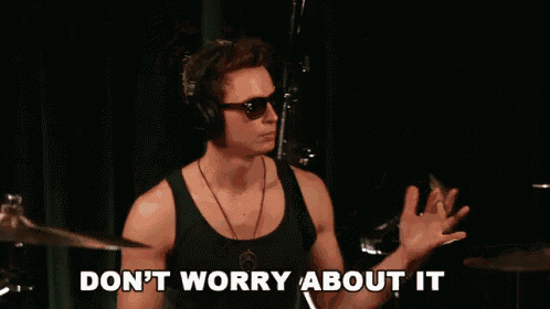 a man wearing headphones and sunglasses is holding a drum stick with the words " don 't worry about it " behind him