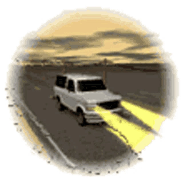 a white van is driving down a road with a yellow arrow pointing to it .