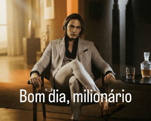 a man in a suit sits in a chair with his legs crossed and the words bom dia milionario written above him