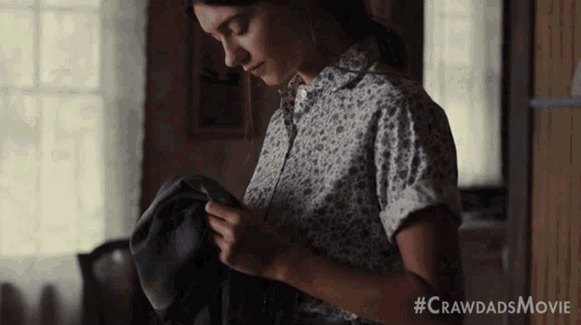 Smelling A Piece Of Clothing Kya GIF - Smelling A Piece Of Clothing Kya Daisy Edgar Jones GIFs