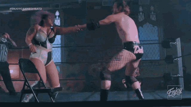 a man in a wrestling ring with the hashtag # enjoycannedheat2 on the bottom