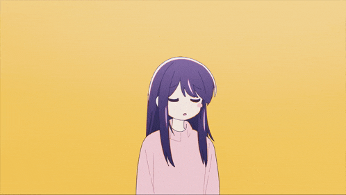a girl with purple hair is wearing a pink sweater and has her eyes closed