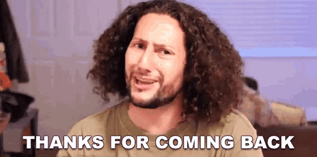 a man with curly hair and a beard says thanks for coming back