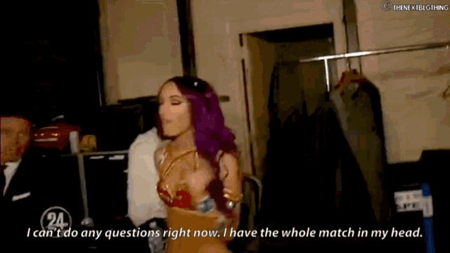 a woman with purple hair says i can 't do any questions right now i have the whole match in my head ..