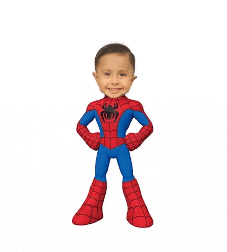 a little boy is dressed in a spiderman costume with his hands on his hips