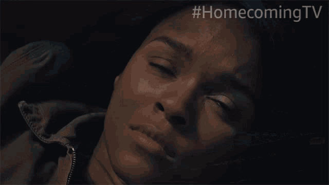 a close up of a woman 's face with the hashtag #homecomingtv visible