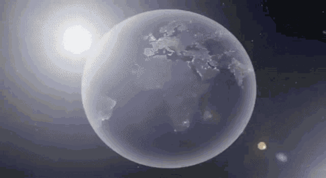 a globe with the sun shining on it