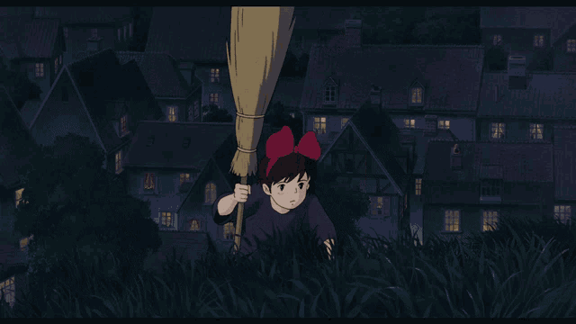 a girl with a red bow is holding a broom in front of a city at night