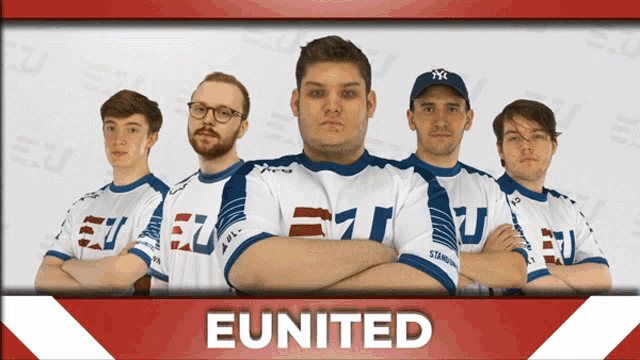 a group of men are standing in front of a banner that says united