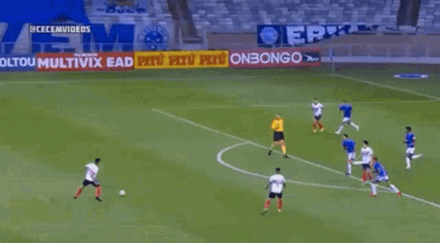 soccer players on a field with a sign that says dos off on it