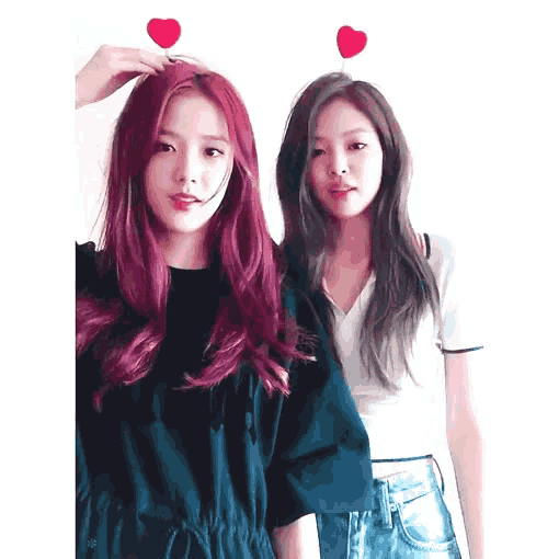 two girls with purple hair are standing next to each other with hearts on their heads