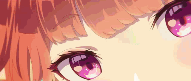 a close up of a girl 's eyes with purple reflections