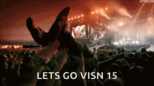 a crowd of people at a concert with the text lets go visn 15