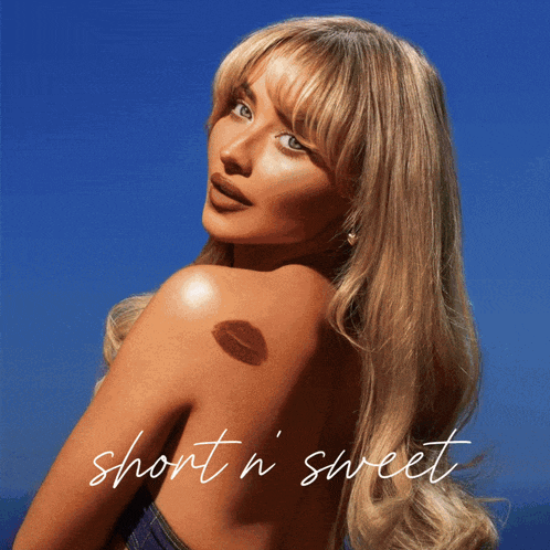 a woman with a tattoo of a kiss on her back with the words short n sweet written below her