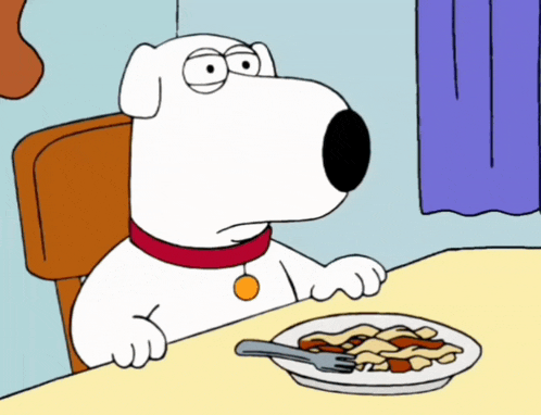 a cartoon dog is sitting at a table with a plate of food