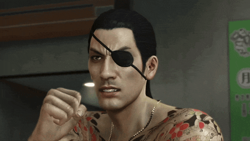a man with a tattoo on his arm has an eye patch