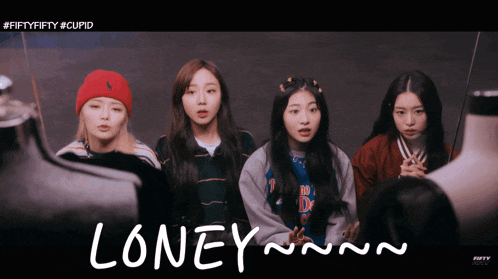 a group of girls standing next to each other with the word lonely written in white letters