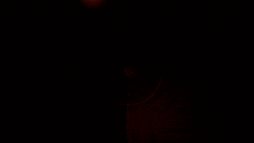 a red and gold sign that says red one with a star in the middle