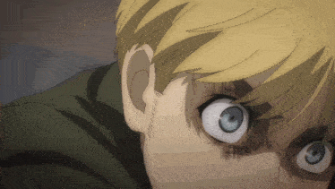 a close up of a man 's face with a very angry look on his face