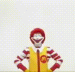 mcdonald 's ronald mcdonald is holding his arms in the air .