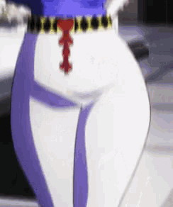 a close up of a person 's pants with a belt that has a red cross on it