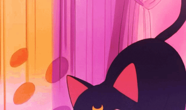 a cat with a crescent moon on its head is laying on a pink background