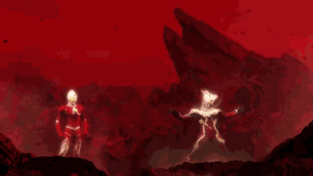 a man in a red suit stands next to another man in a white suit