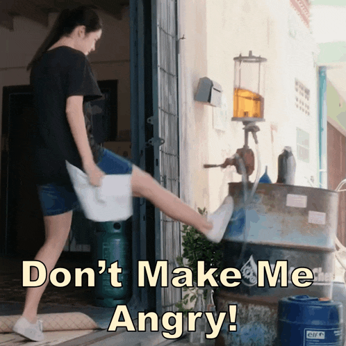 a woman kicking a towel with the words " don 't make me angry " written on the bottom
