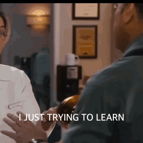a man is talking to a doctor who is holding a bottle and says " i just trying to learn "