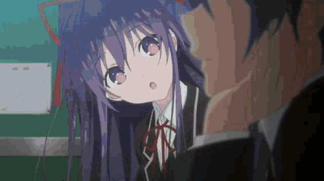a girl with purple hair is standing next to a man
