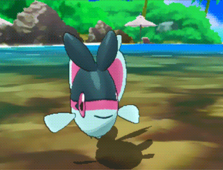 a cartoon fish is standing on a sandy beach near the water