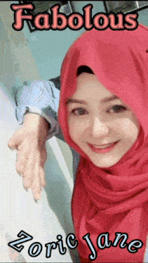 a woman wearing a red hijab with the name zoric jane
