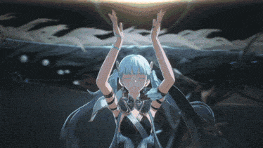 a person 's hands are up in the air in front of a light