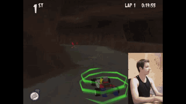 a man is playing a video game with lap 1 displayed