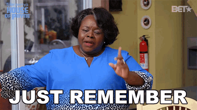 a woman in a blue shirt is saying " just remember "